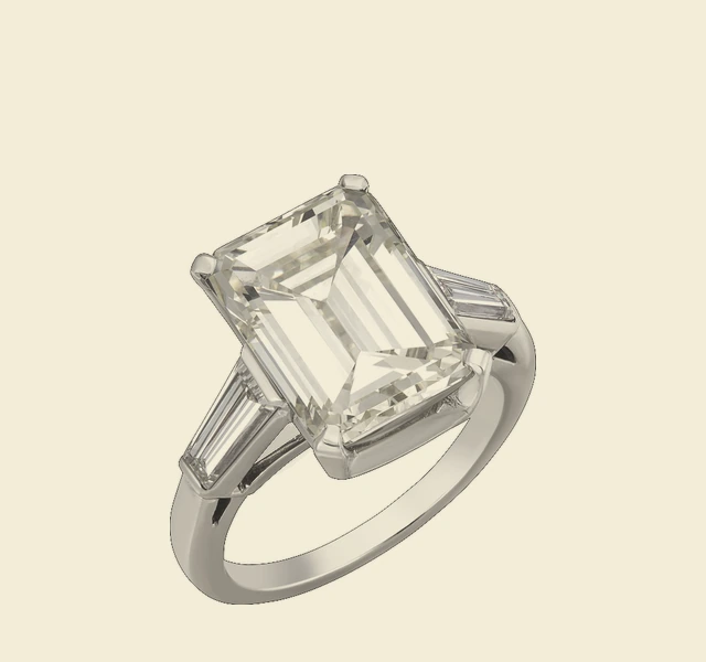 Ring, emerald-cut diamond flanked by baguette diamonds
