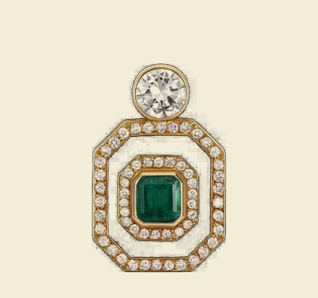 Pendentif serti d'une émeraude entourée de diamants